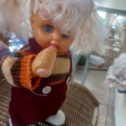 Vintage baby doll set of 2, one with moving legs