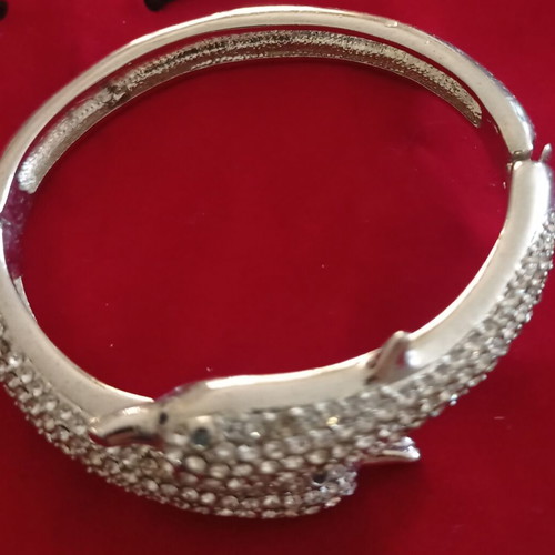 Bangle bracelet with dolphin design and sparkling rhinestones like new, silver