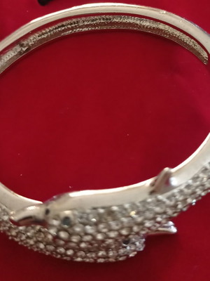 Bangle bracelet with dolphin design and sparkling rhinestones like new, silver