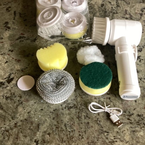 Rotating cleaning brush with extra attachments