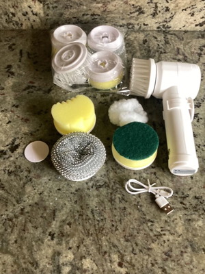 Rotating cleaning brush with extra attachments