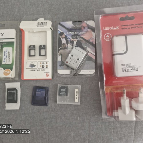 Ultralux 4-USB Travel Charger with Sony M2 256MB and SanDisk adapters bundle