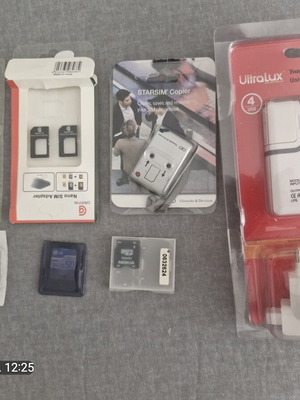 Σετ Ultralux φορτιστής ταξιδίου με 4 USB, Sony M2 256MB και προσαρμογείς SanDisk