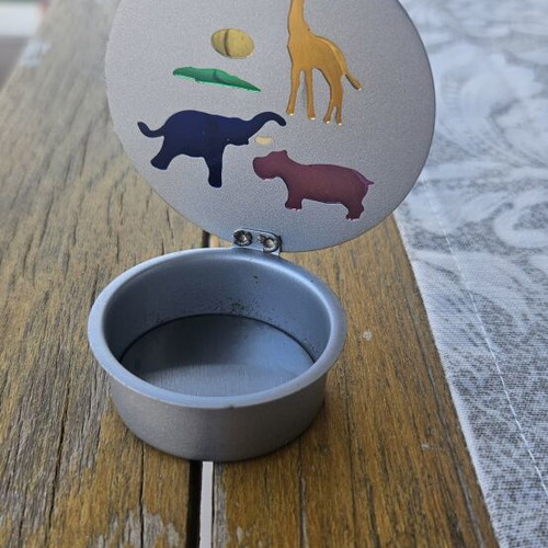 Metal tealight holder with stained glass animals