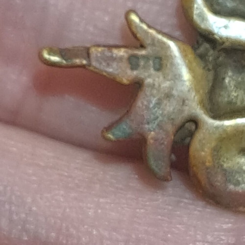 Vintage metallic pendant used, missing 2 stones