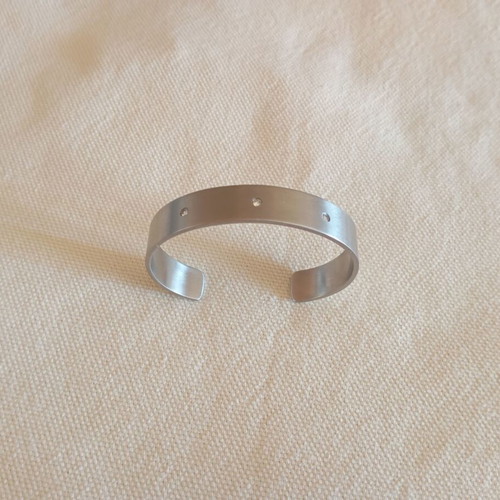 Steel bracelet like new with satin finish and stones
