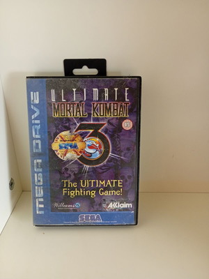Ultimate Mortal Kombat game for Sega Mega Drive, complete with manual