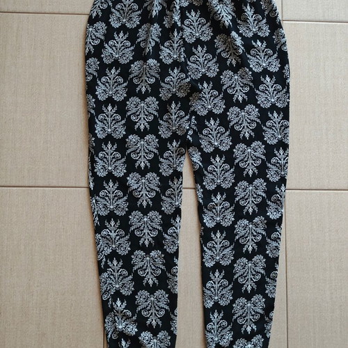 Flowy pants with black and white pattern, size S
