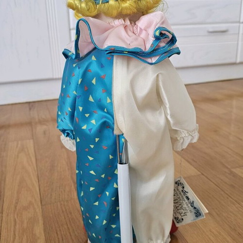 Heritage Mint porcelain doll like new with stand