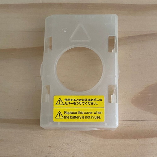 Nikon D-SLR battery cover used, clear plastic replacement