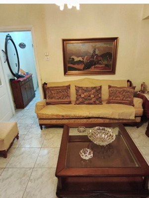 Living room furniture set like new with vitrina, sofa, chairs, and tables