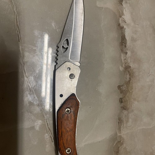 Folding Pocket Knife used, stainless steel blade with wooden handle