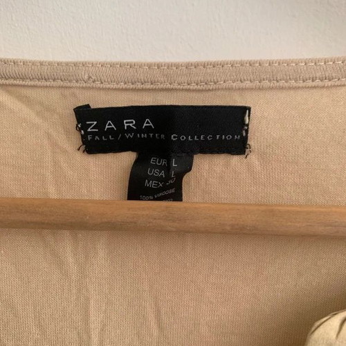 Zara blouse beige size L used with small hole and wear