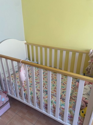 Cot bed white color like new with mattress and waterproof cover