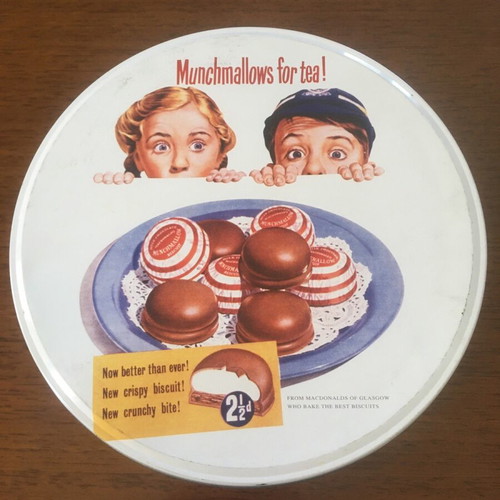 Metal tin used, round red with Munchmallows advertisement