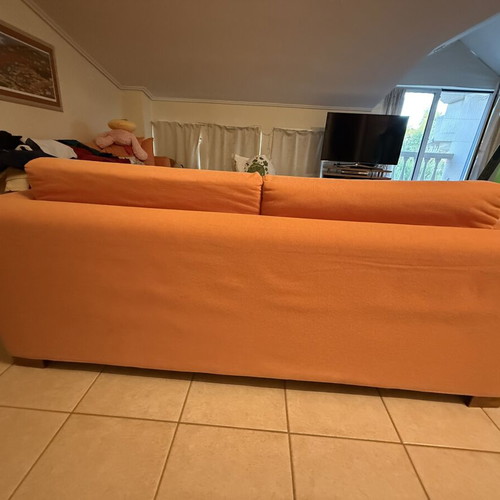 Sofa bed SATO used with two decorative pillows and throw
