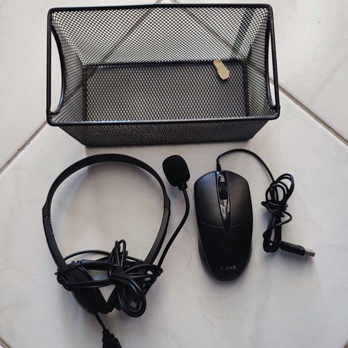 Computer accessories used, wired mouse and wired headset with basket