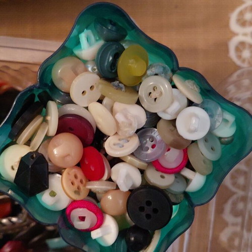 Collection of small and large buttons, beads and iron buttons
