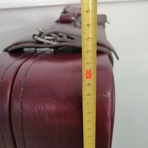 Vintage suitcase used, burgundy color, 1970s with metal clasps