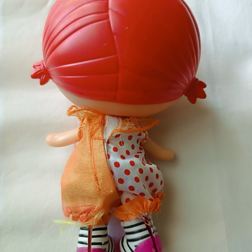 Lalaloopsy doll used, dress with loose thread on leg