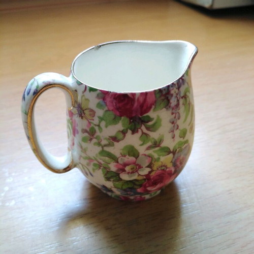 Miniature milk jug from fine English porcelain