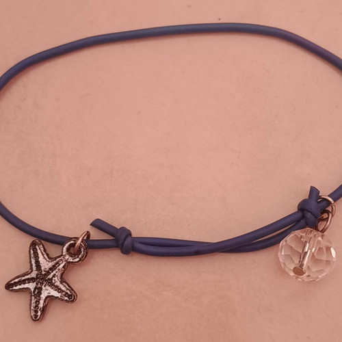 Bracelet with star charm like new, black