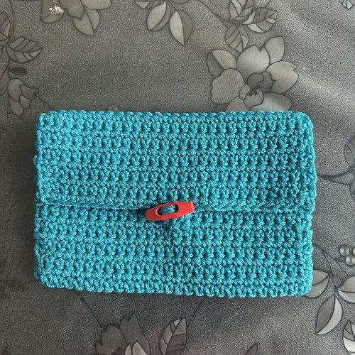 Handmade knitted clutch bag blue with button closure