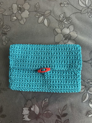 Handmade knitted clutch bag blue with button closure