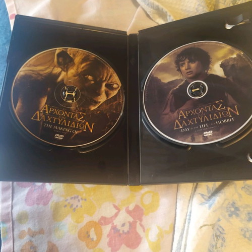 Lord of the Rings collection used, first two movies with double DVD making of