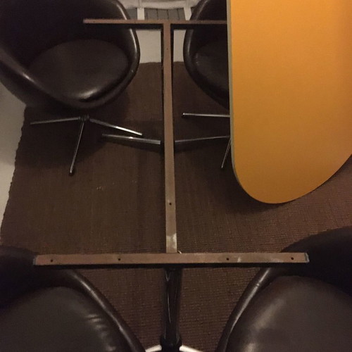 Dining set with 4 used Egg Chairs 1970s vintage design