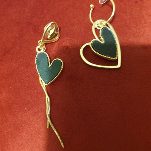 Earrings new gold with black, different design for each ear