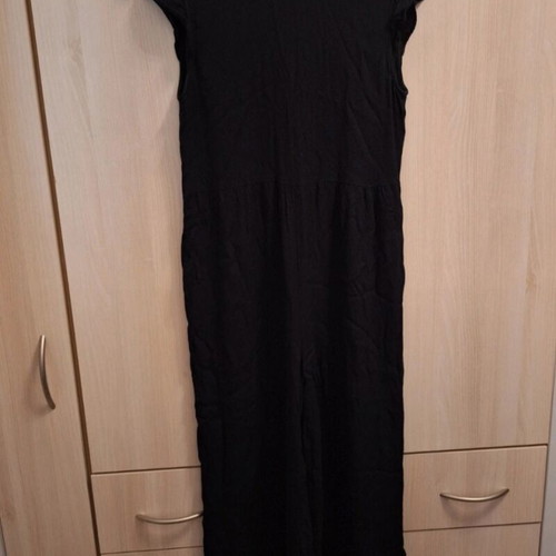 Zara jumpsuit like new, black with fringes at hem