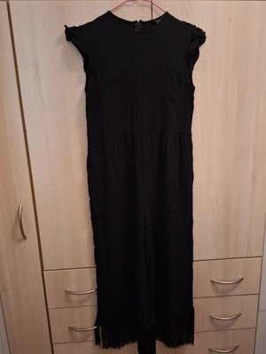 Zara jumpsuit like new, black with fringes at hem