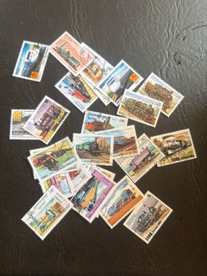 Vintage stamp collection with trains and steam engines, new