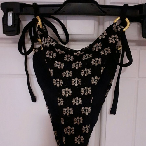 Shein bikini swimsuit used black with white embossed flowers and gold rings