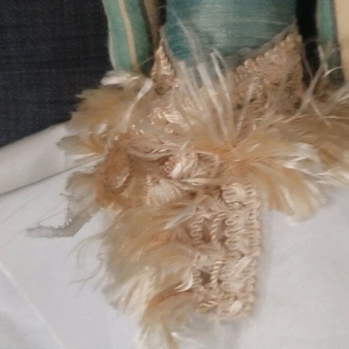 Handmade doll used with fabrics and detailed design