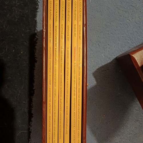 National Geographic magazines like new, 85 issues in custom leather cases