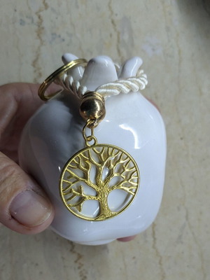 Decorative pomegranate and keychain porcelain, like new