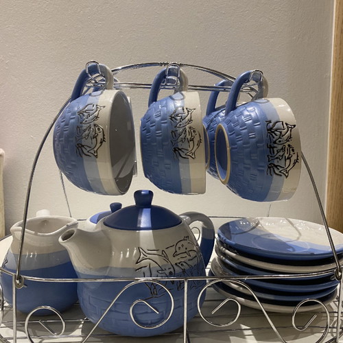 Ceramic tea set used with carved designs, 6 cups