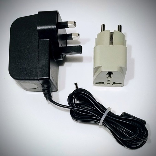 Power adapter 9V 2A like new with UK to Greek plug adapter