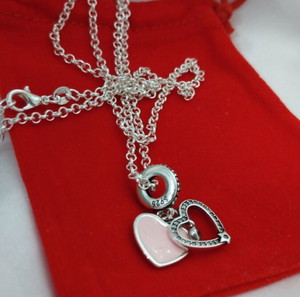 ασημένια αλυσίδα με ασημένιο κρεμαστό