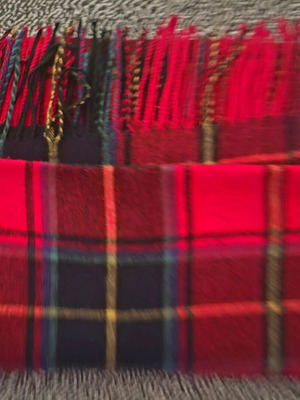 Blanket scarf with red tartan pattern and fringes, like new