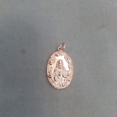 Christian pendant from the 70s, new, gold-colored metal