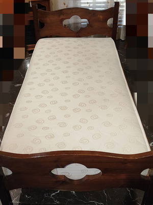 Solid wood single bed with clean mattress