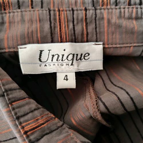 Striped brown and orange Unique shirt used, size L