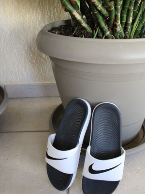 Nike kids' slides size 36, black and white