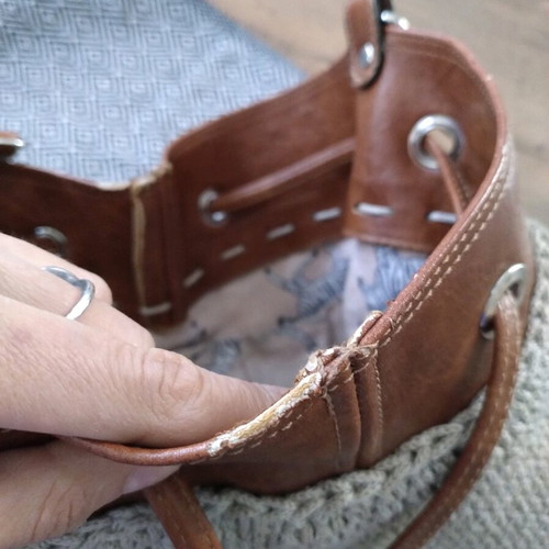 Handmade bucket bag used with brown leather details