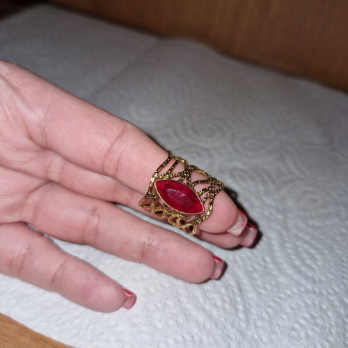 Fwo ring gold color with red stone and adjustable size like new