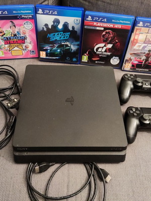 PlayStation 4 console with 1TB, 2 controllers and games bundle