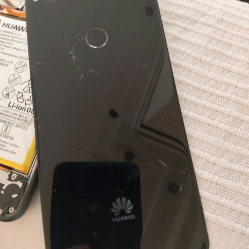 Huawei P8 Lite (2017) used with broken back cover and swollen battery